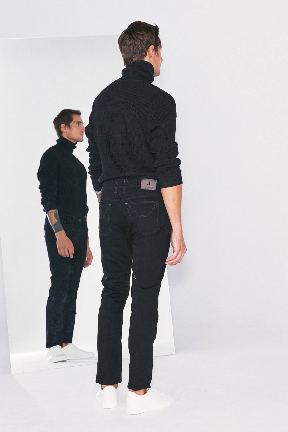 Jeckerson Pantalone 5 tasche in denim nero rinse con toppa in Alcantara® In Vendita