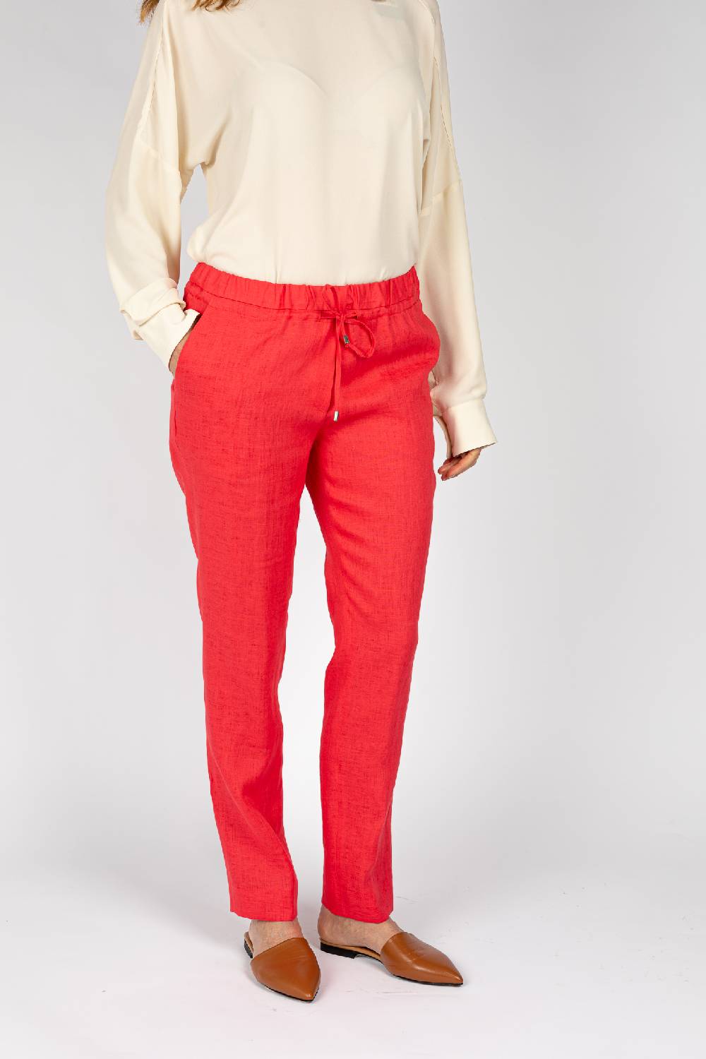 L.Pucci Pantaloni colore corallo, linea morbida Sconto
