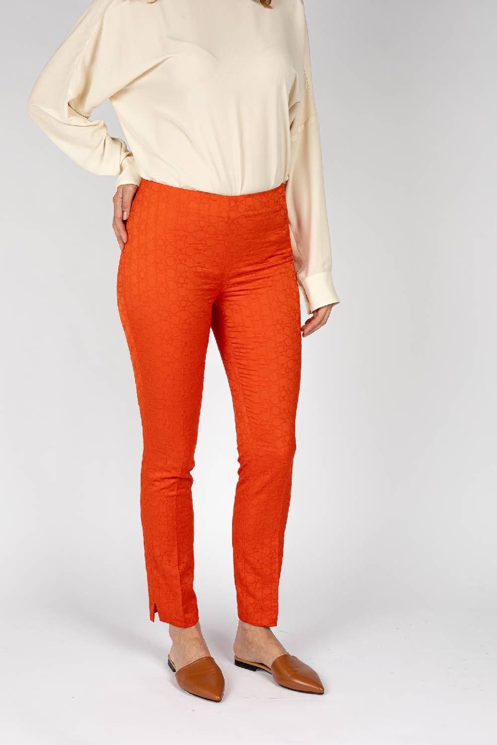 L.Pucci Pantaloni jacquard a fiore colore arancio, linea stretta I Più Venduti