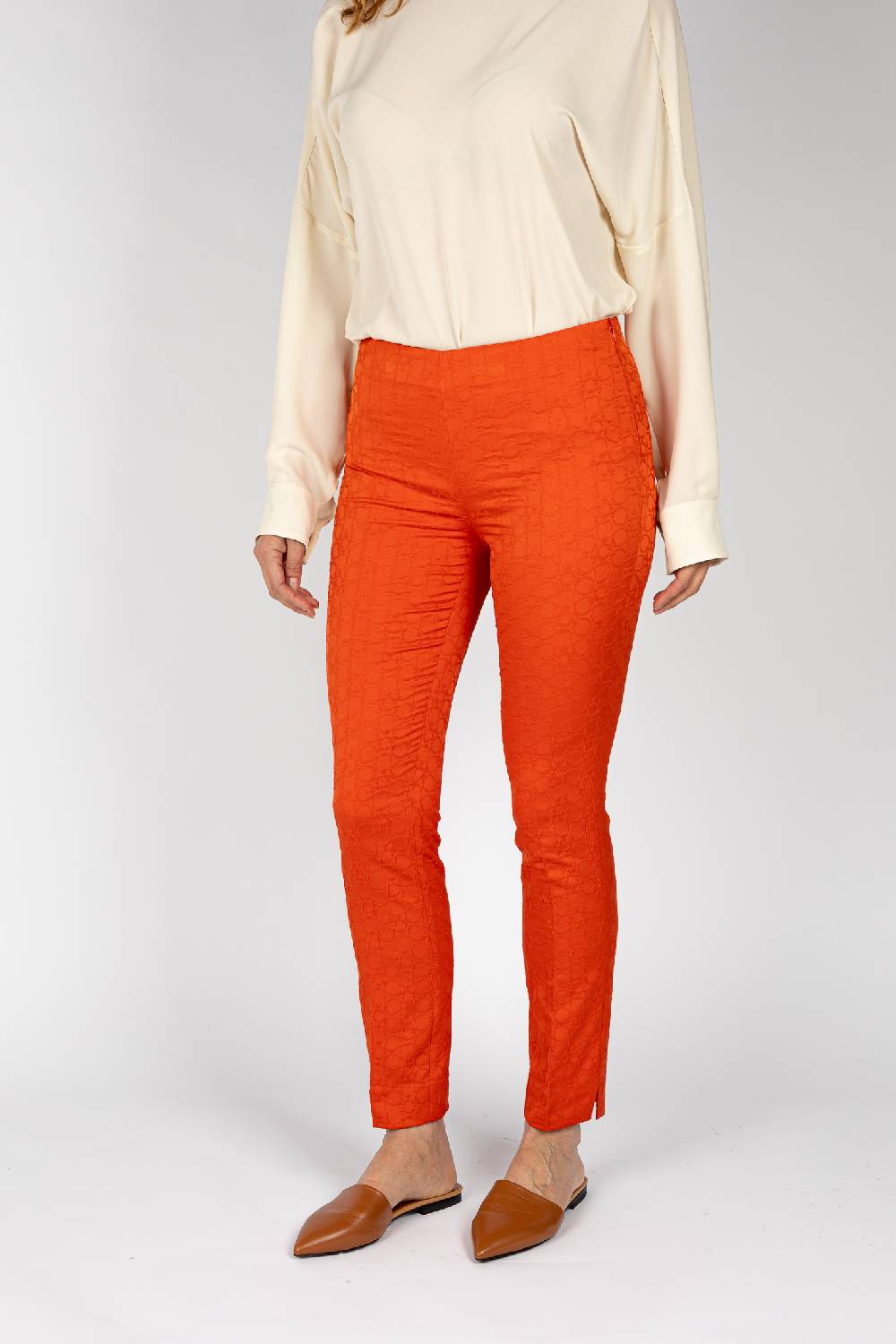 L.Pucci Pantaloni jacquard a fiore colore arancio, linea stretta I Più Venduti