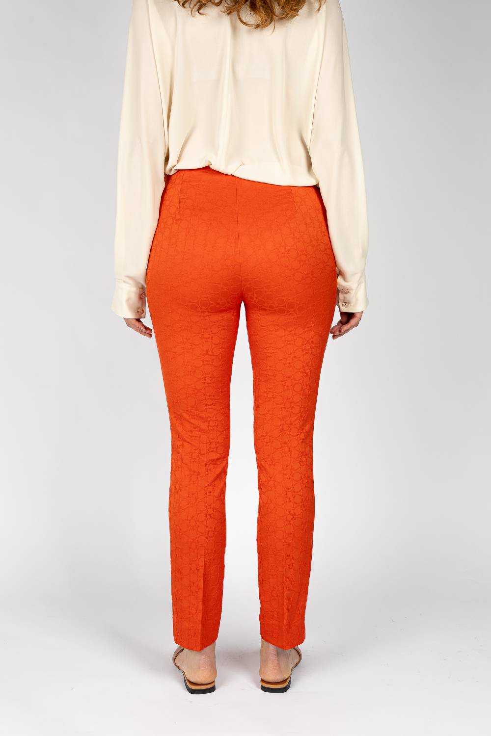 L.Pucci Pantaloni jacquard a fiore colore arancio, linea stretta I Più Venduti