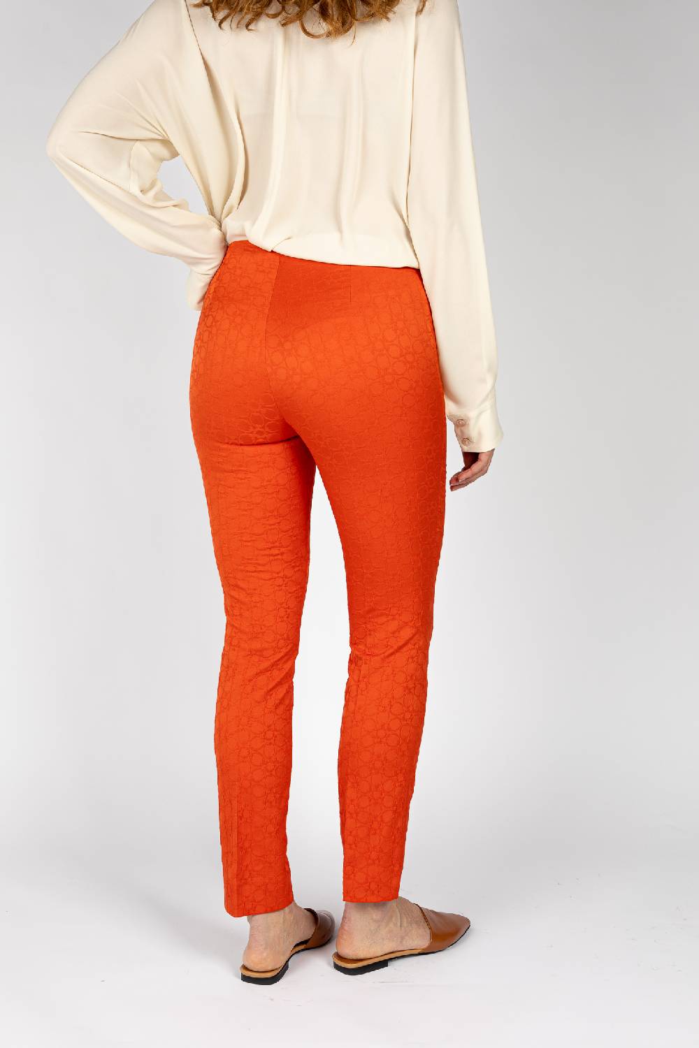 L.Pucci Pantaloni jacquard a fiore colore arancio, linea stretta I Più Venduti
