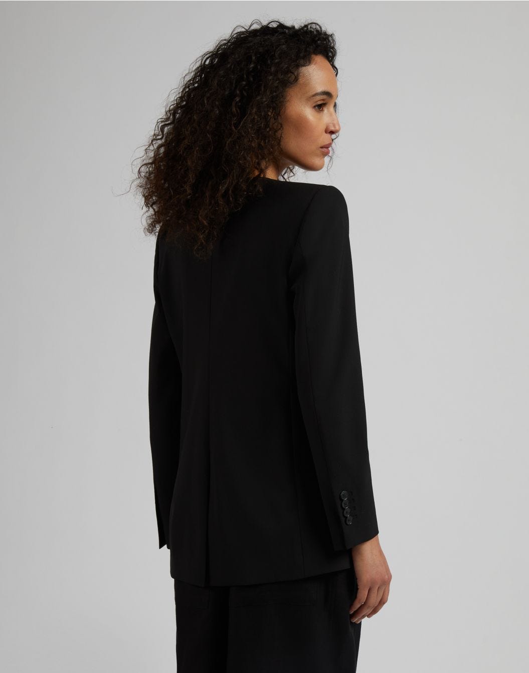 Lardini Giacca monopetto senza collo in tela di lana stretch nera Nuovo