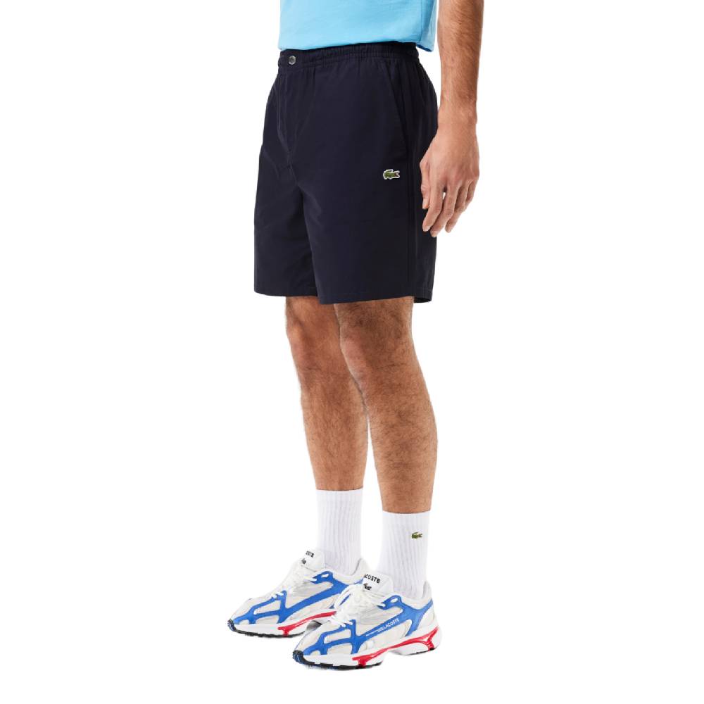 LACOSTE PANTALONI CORTI RELAXED FIT ELASTICIZZATI IN POPELINE DI COTONE GH7220HDE SKU: GH7220HDE Soddisfazione Garantita
