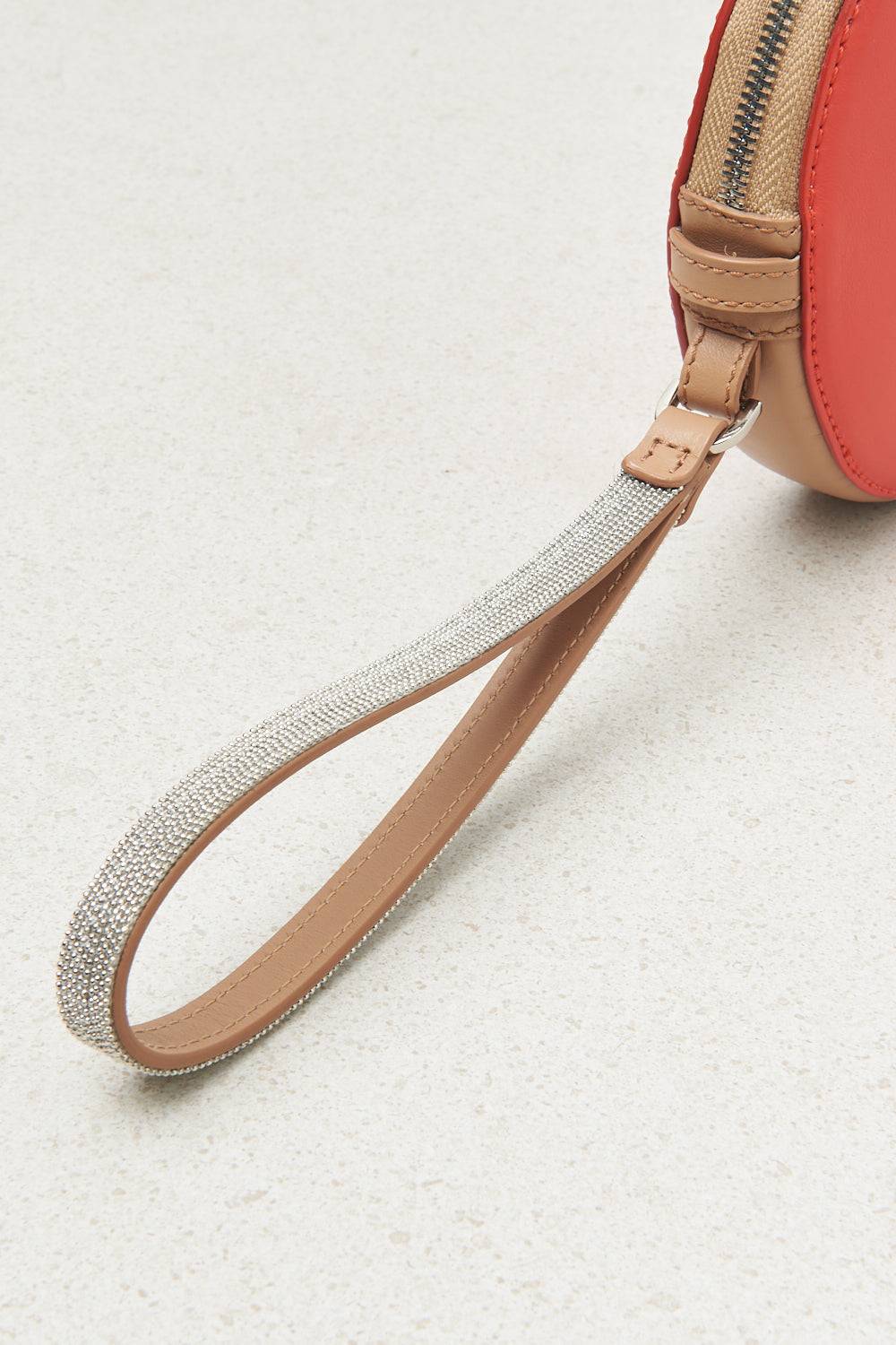 Peserico Borsa rotonda in vera pelle con polsiera e tracolla Italy
