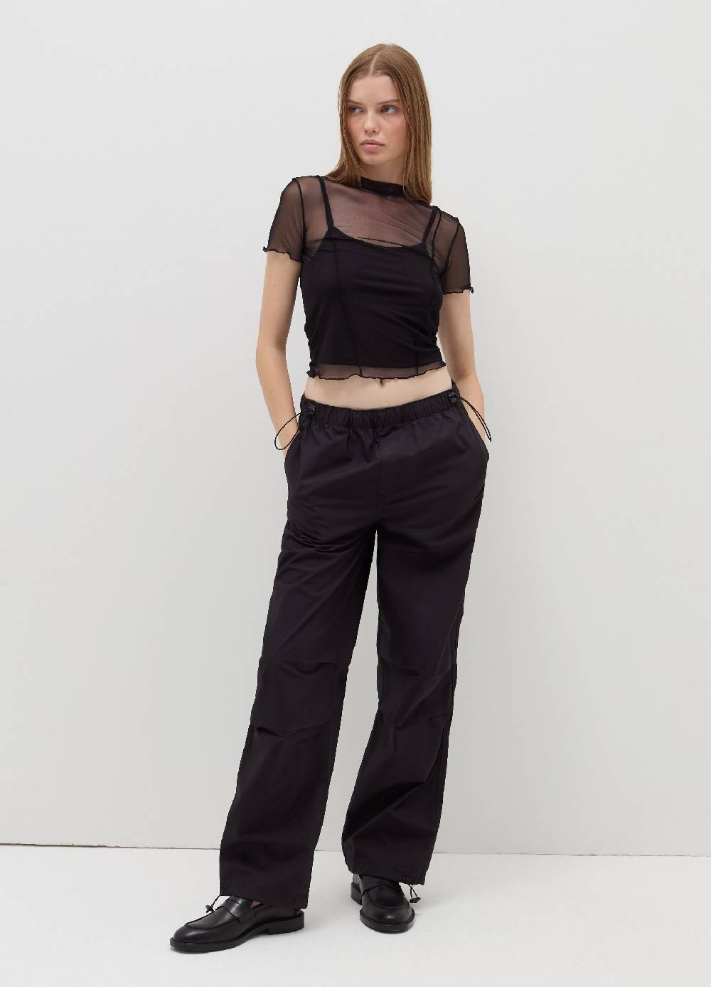 B. ANGEL T-shirt crop in mesh con profili ondulati