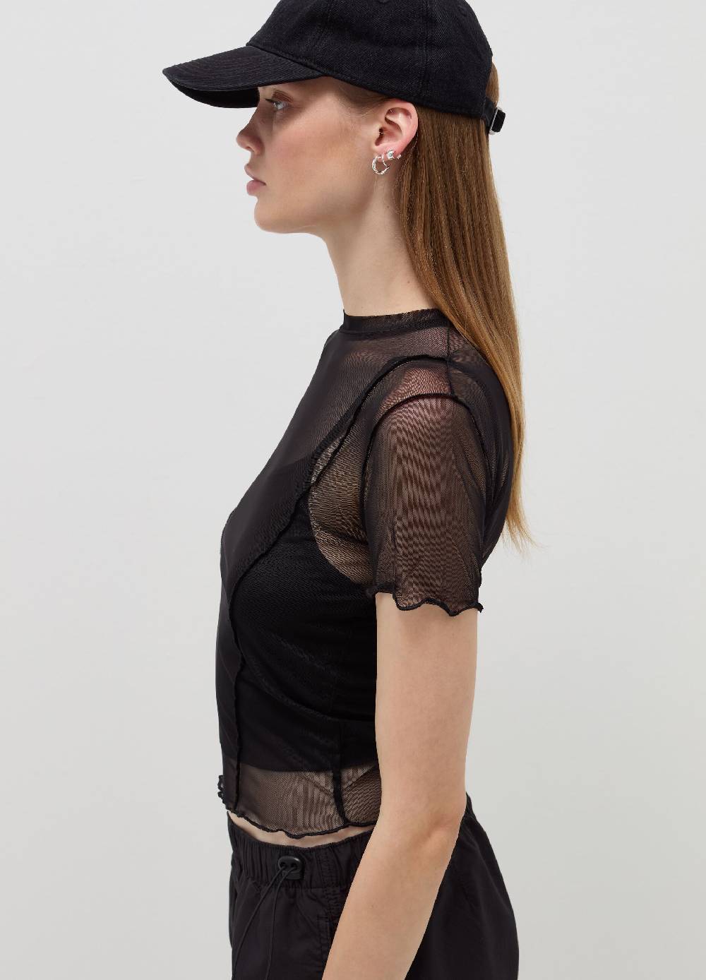 B. ANGEL T-shirt crop in mesh con profili ondulati Negozio