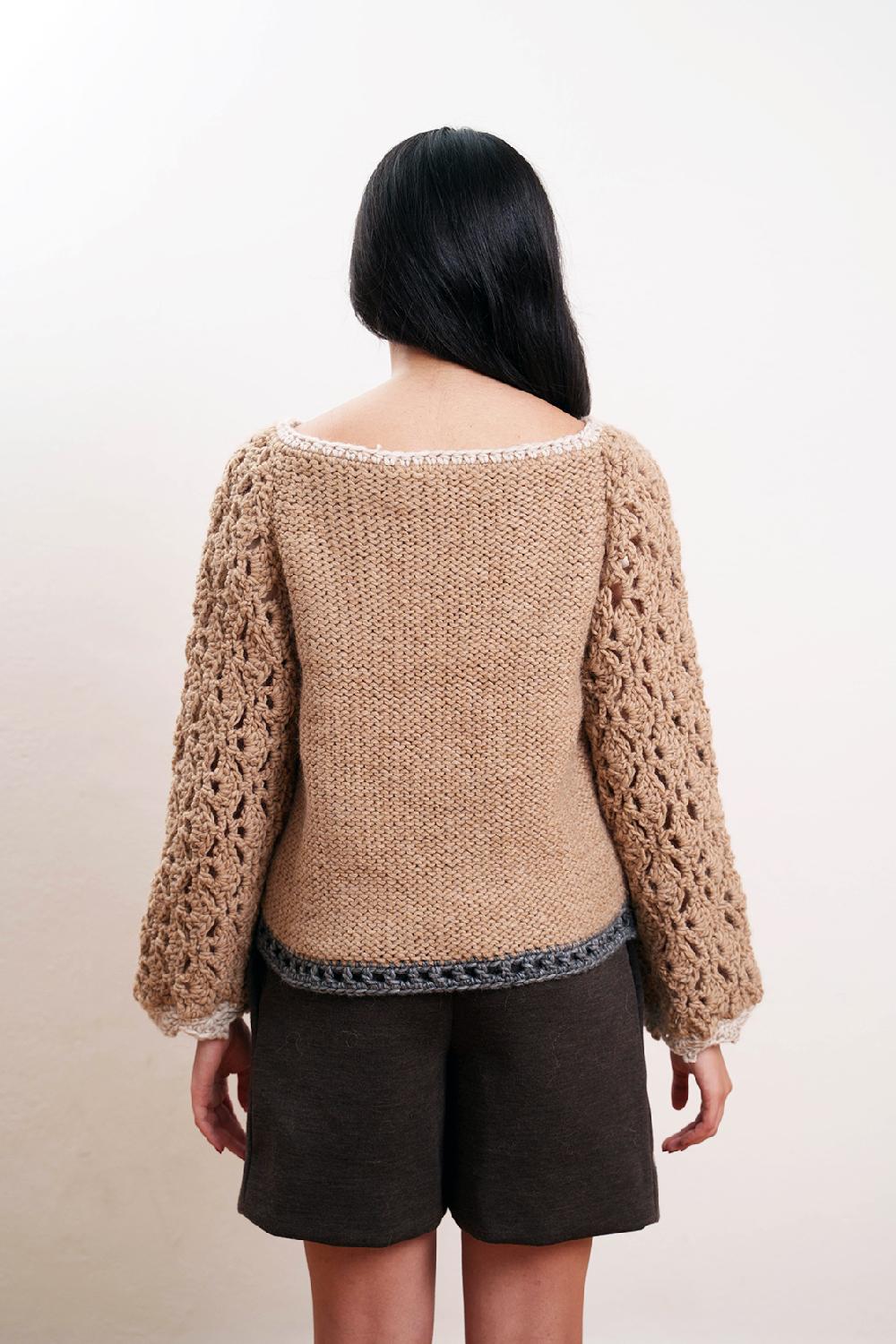 Tricot à Porter Maglia traforata scollo a barca manica ampia fondo diritto In Vendita